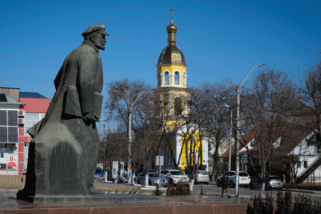 The monument of Soviet founder Vladimir Lenin in the center of Comrat, Moldova, Saturday, March 12, 2022. 