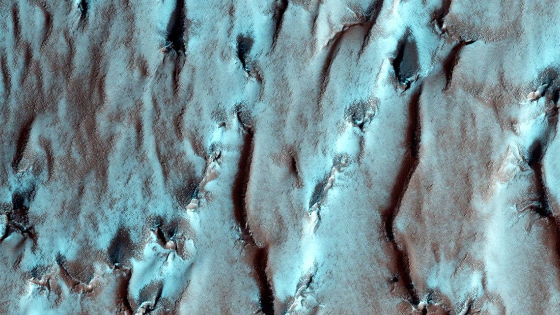 Mysterious reflections on Mars might come from something stranger than water